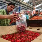 Pemerintah Siap Tindak Tegas Pedagang Bahan Pangan yang Naikkan Harga di Atas HET